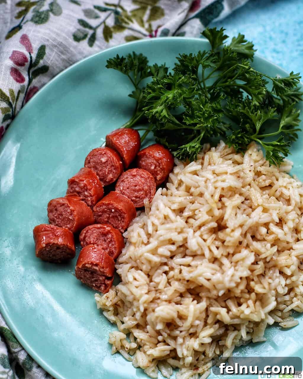 Flavorful Instant Pot Garlic Rice 14 hot dogs with garlic rice on a plate