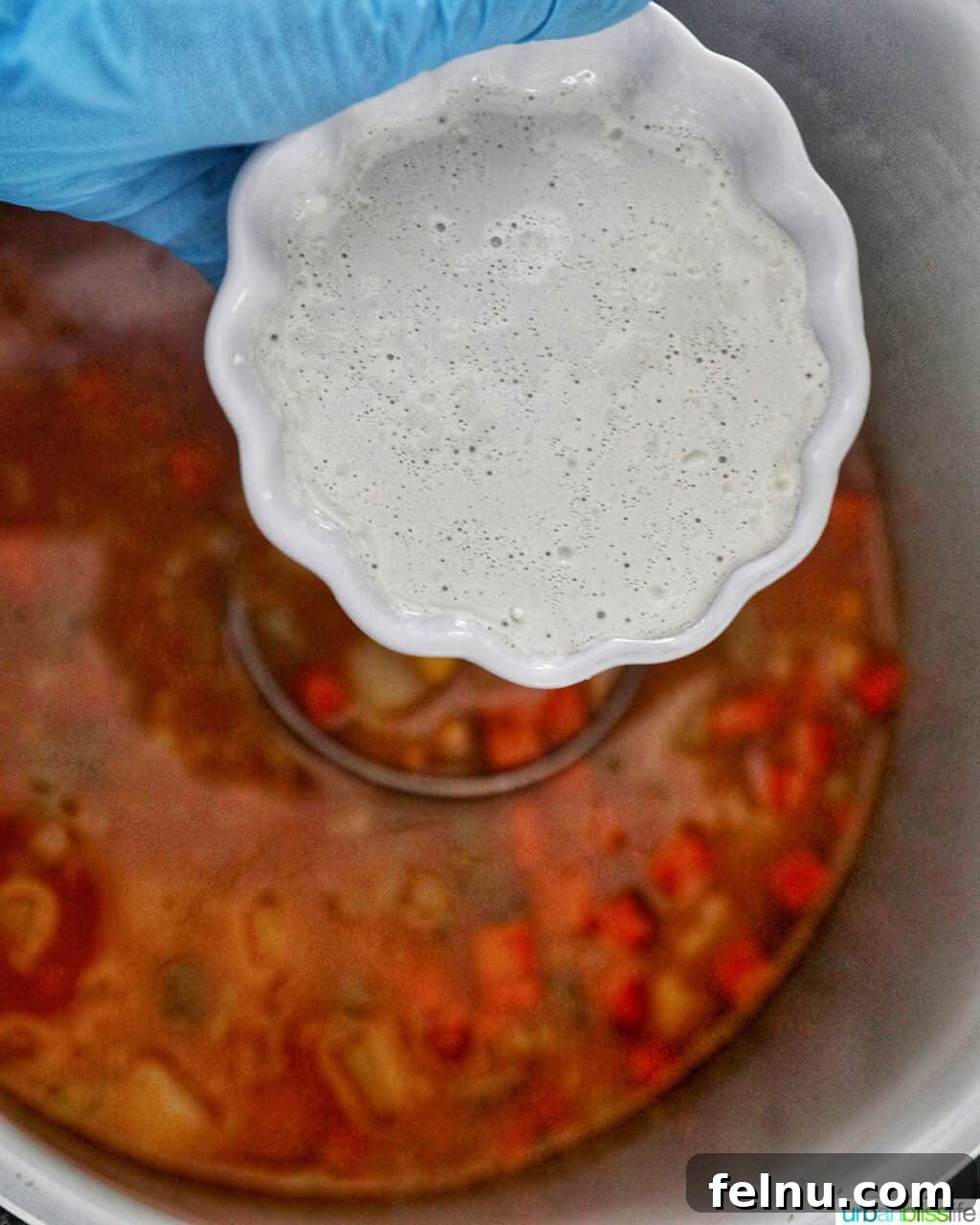 Creamy Potato Corn Chowder Made Easy 15 Cornstarch slurry in a bowl