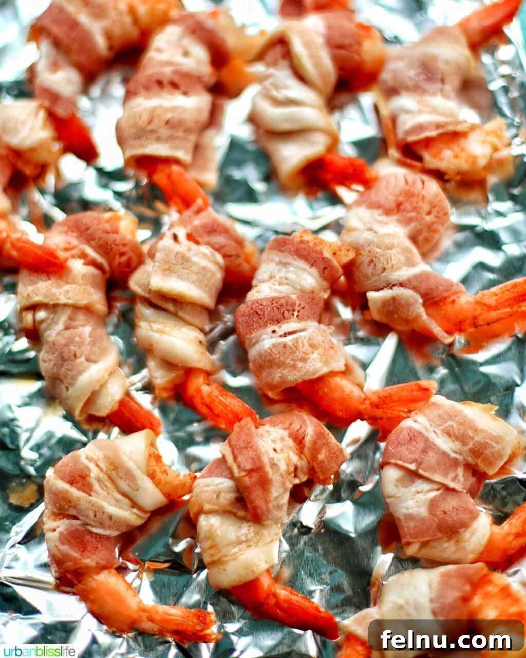 Air Fryer Bacon Shrimp Skewers 9 Air fryer bacon wrapped shrimp on foil