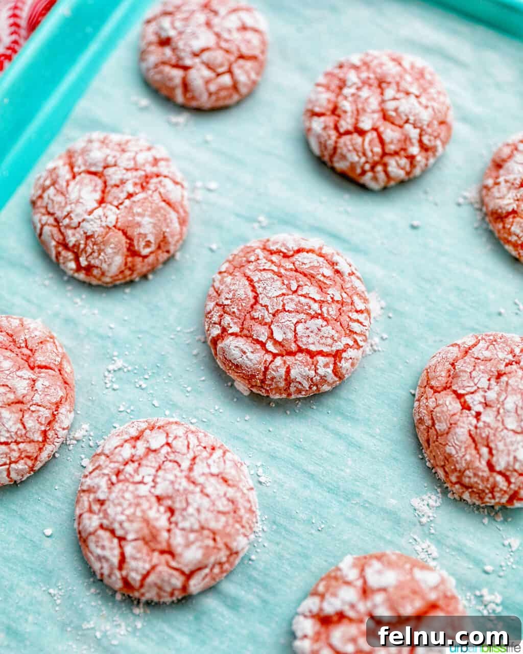 Strawberry Crinkle Cookies on Baking Sheet