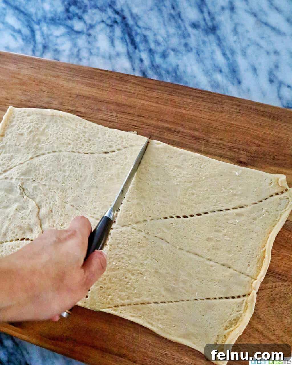 Crispy Air-Fried Pigs in a Blanket 5 cutting crescent dough