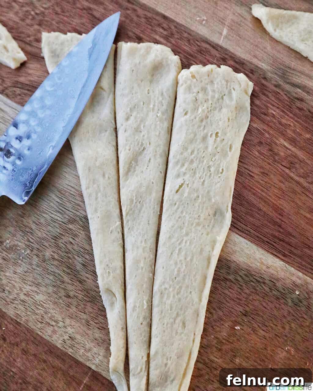 Crispy Air-Fried Pigs in a Blanket 6 sliced dough triangle into three