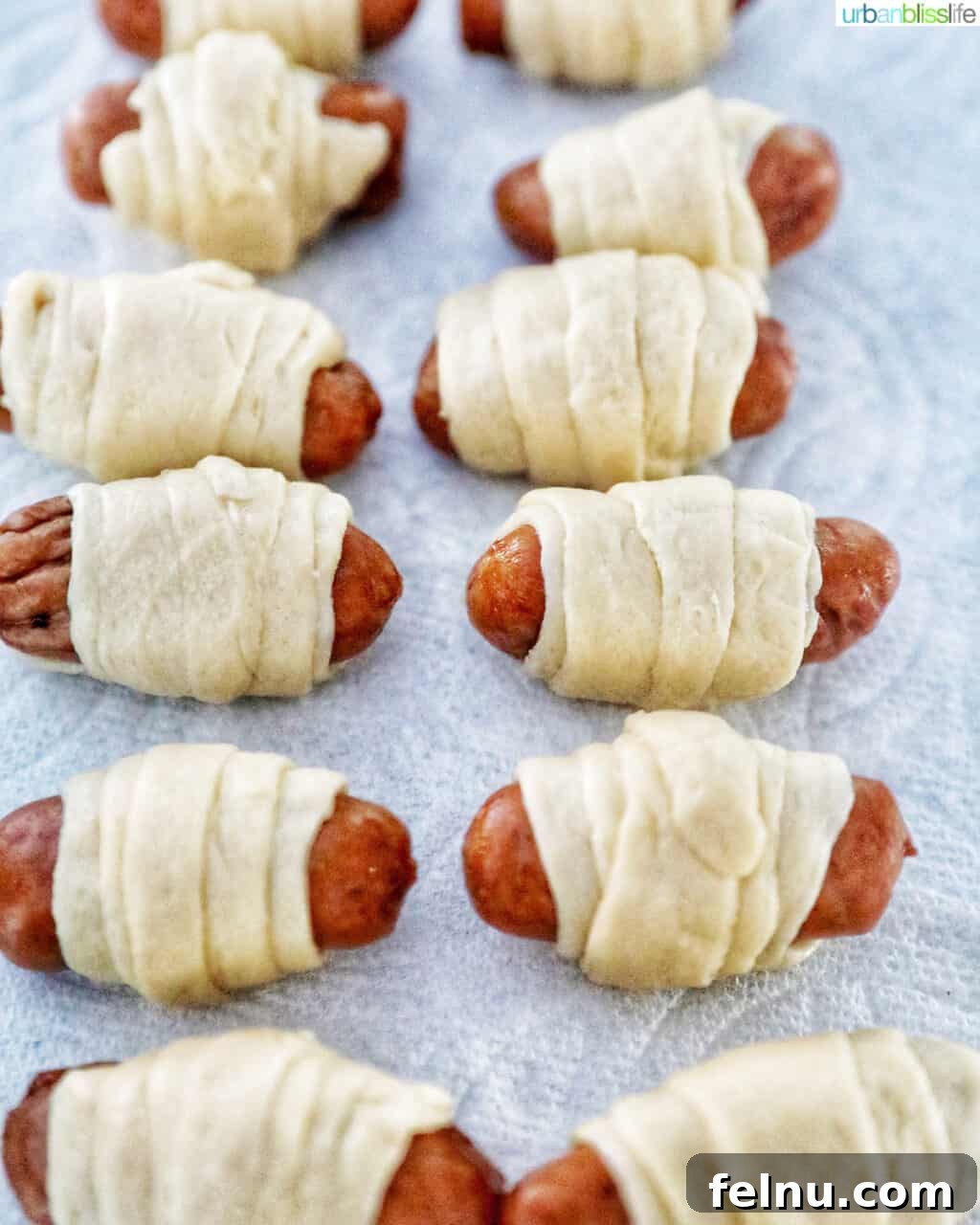 Crispy Air-Fried Pigs in a Blanket 9 rolled up pigs in a blanket ready to air fry