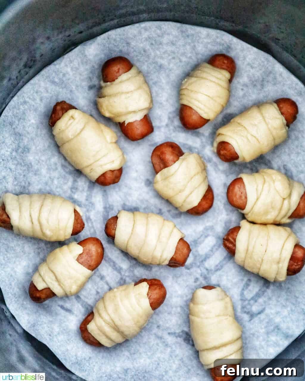 Crispy Air-Fried Pigs in a Blanket 10 Air Fryer Pigs in a Blanket in air fryer basket