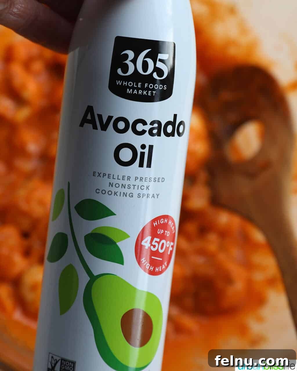Fiery Air-Fried Cauliflower Poppers 12 Avocado oil spray being used to mist buffalo cauliflower.