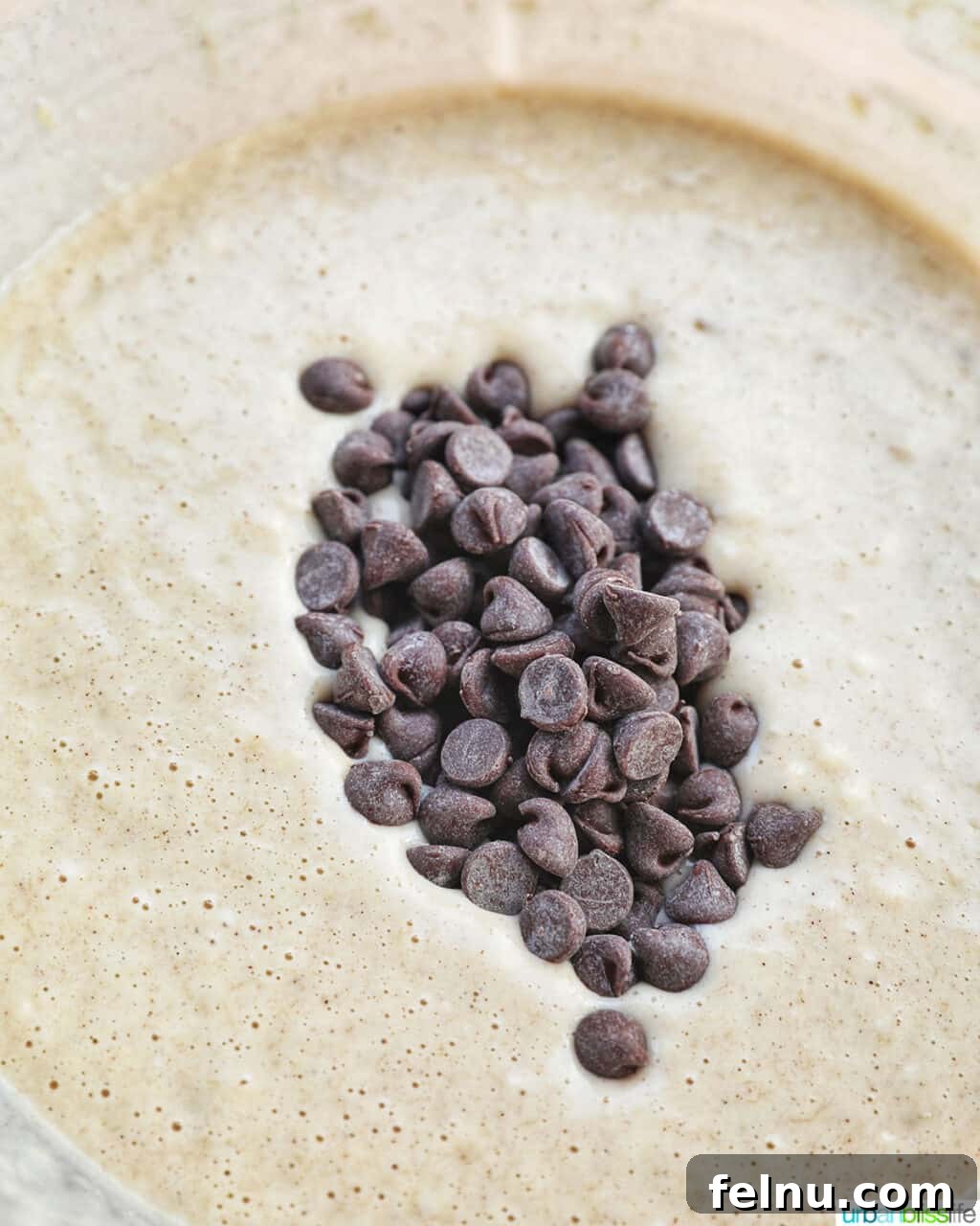 Banana Chocolate Chip Dream Waffles 11 Adding chocolate chips to the waffle batter