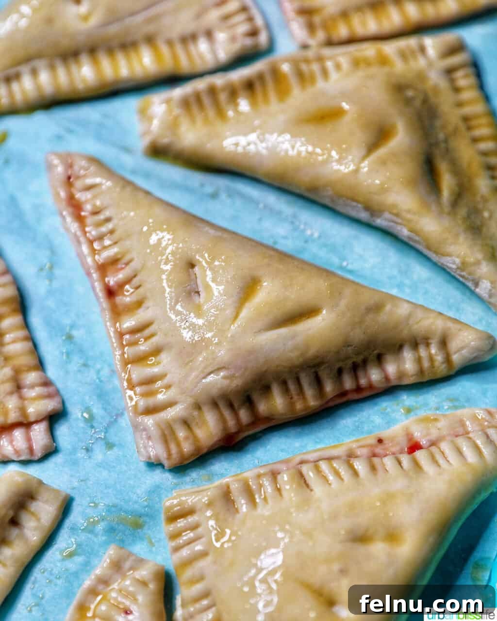 Flaky Strawberry Pockets 12 cut marks on air fryer strawberry turnovers pastry