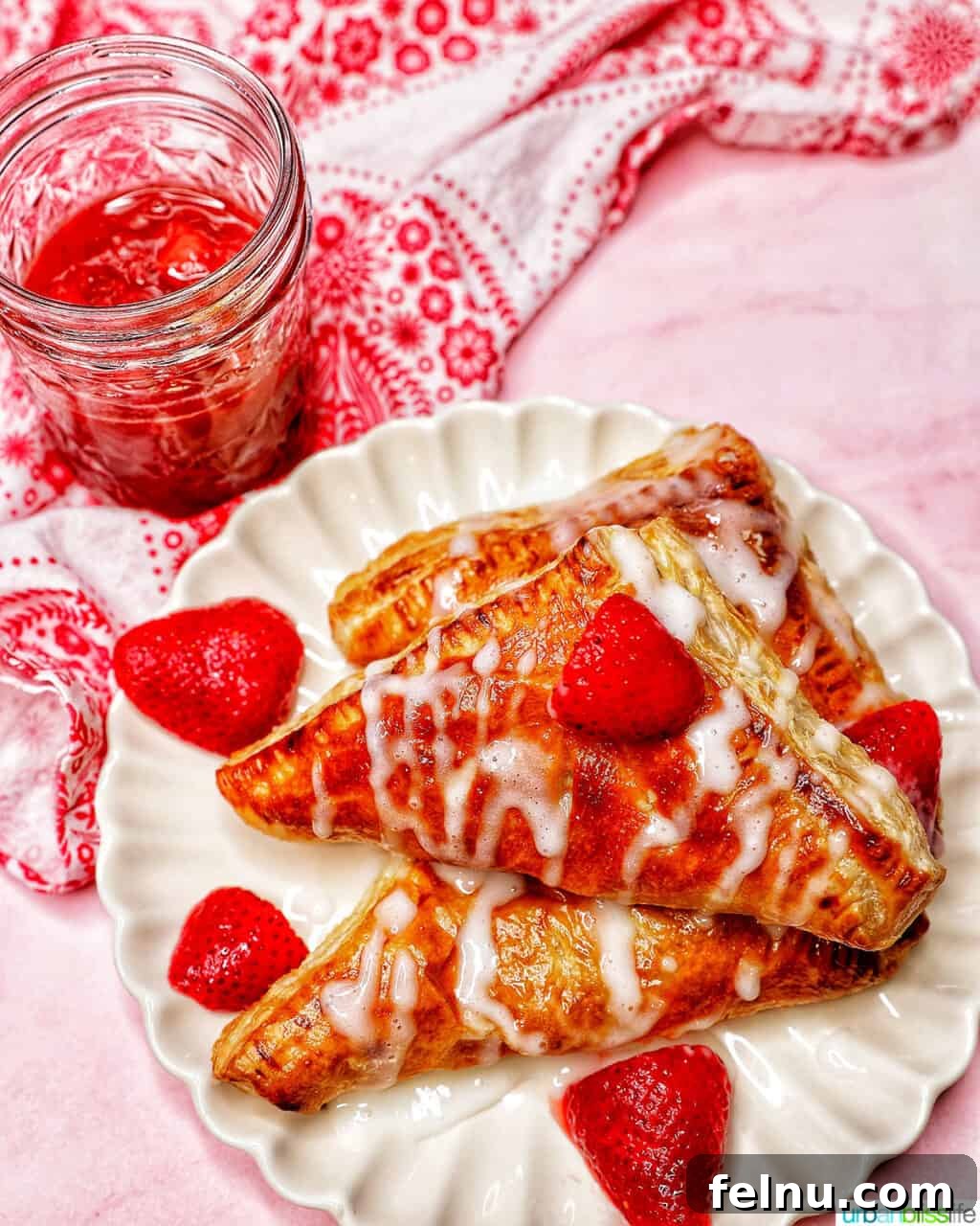 Flaky Strawberry Pockets 19 overhead of iced air fryer strawberry turnovers
