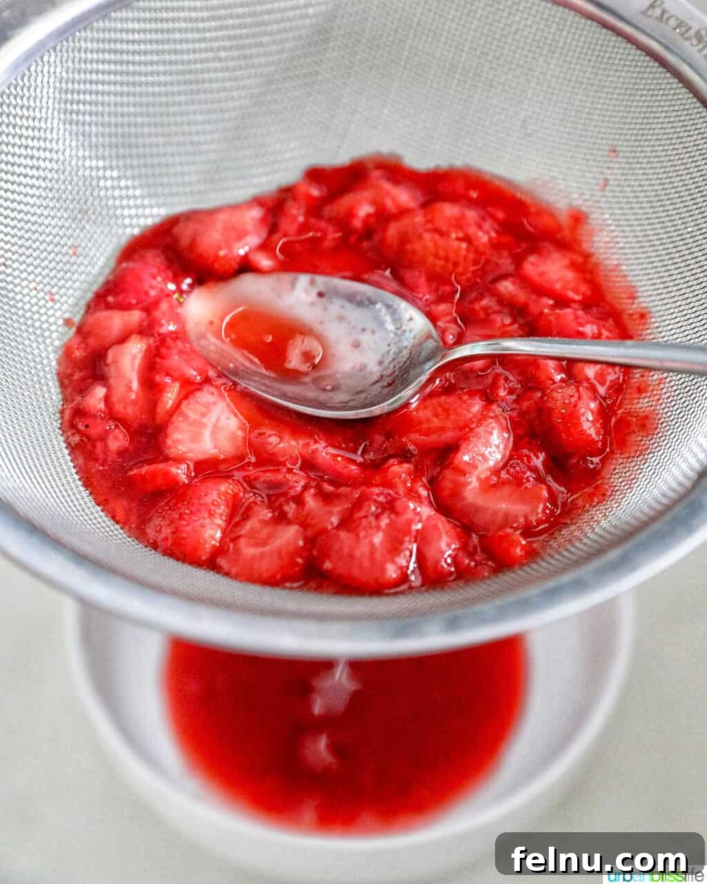 Flaky Strawberry Pockets 5 straining strawberries