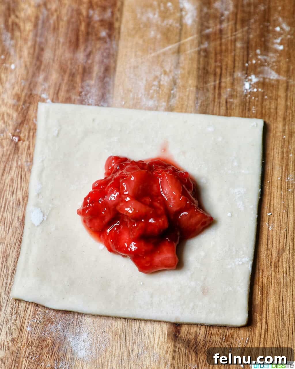 Flaky Strawberry Pockets 10 strawberry jam in center of puff pastry