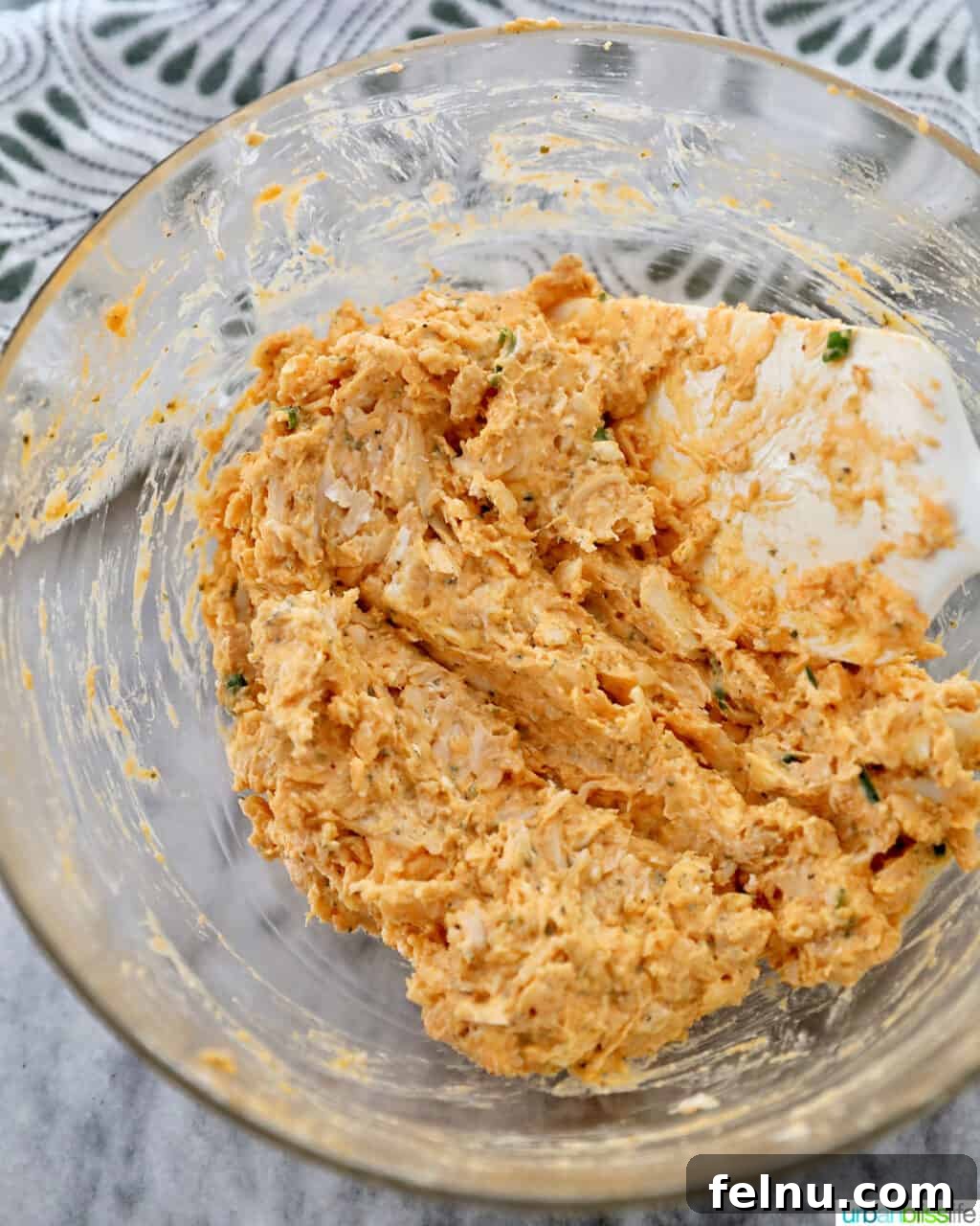 Spicy Buffalo Chicken Poppers 10 The fully mixed buffalo chicken filling in a bowl, ready for scooping.