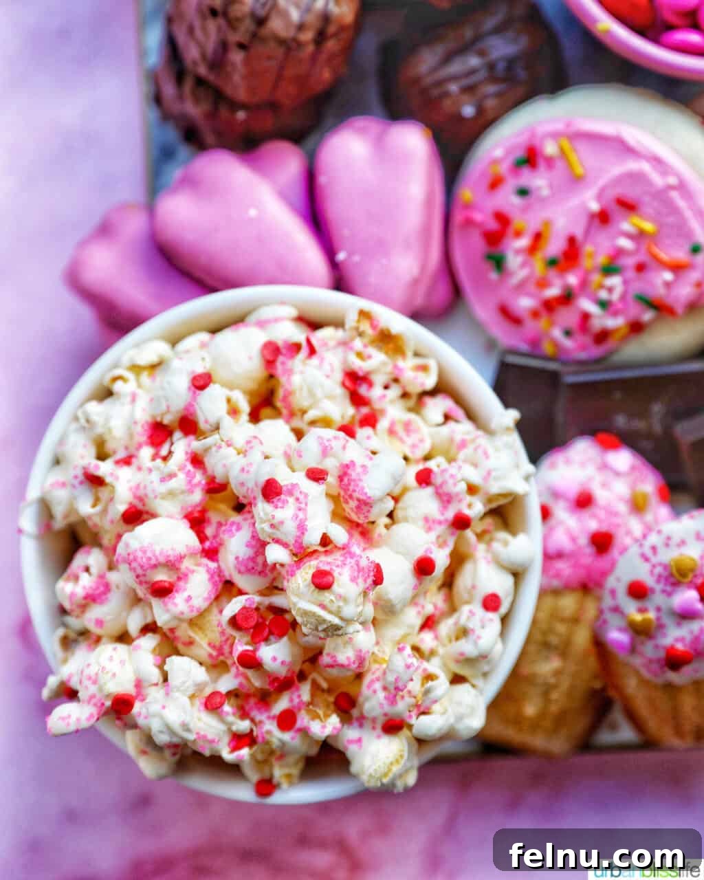 Valentine's Day Popcorn Delight 3 Valentine's Day Popcorn on the corner of a Valentine's Day dessert tray