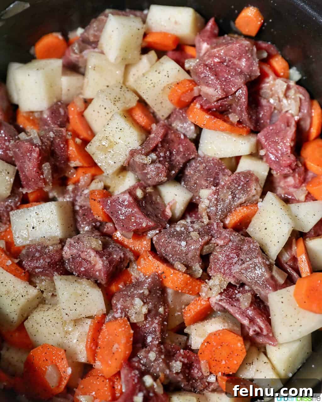 Cooking beef caldereta.