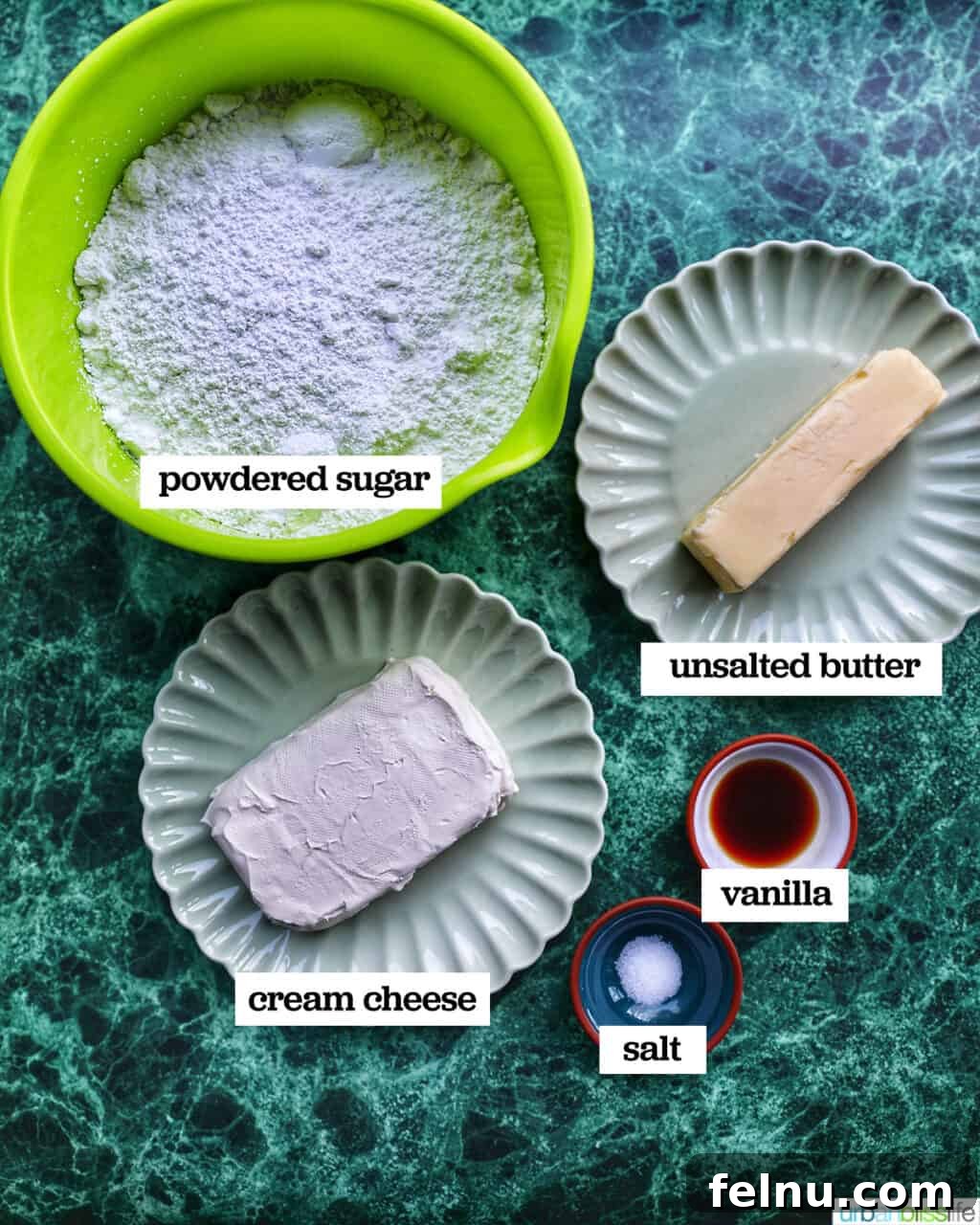 Emerald Velvet Delight with Tangy Cream Cheese 6 Ingredients for cream cheese frosting including butter, cream cheese, powdered sugar, and vanilla extract.