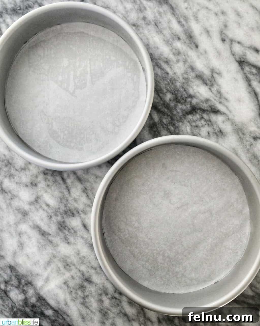 Emerald Velvet Delight with Tangy Cream Cheese 7 Two cake pans lined with parchment paper, ready for batter.