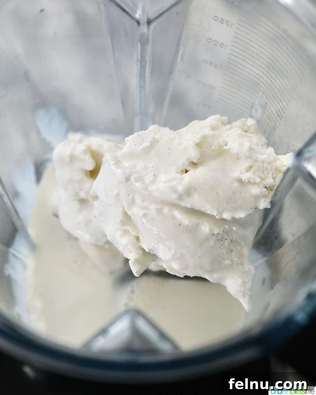 The Best Homemade Shamrock Shake 6 Adding ice cream to a blender