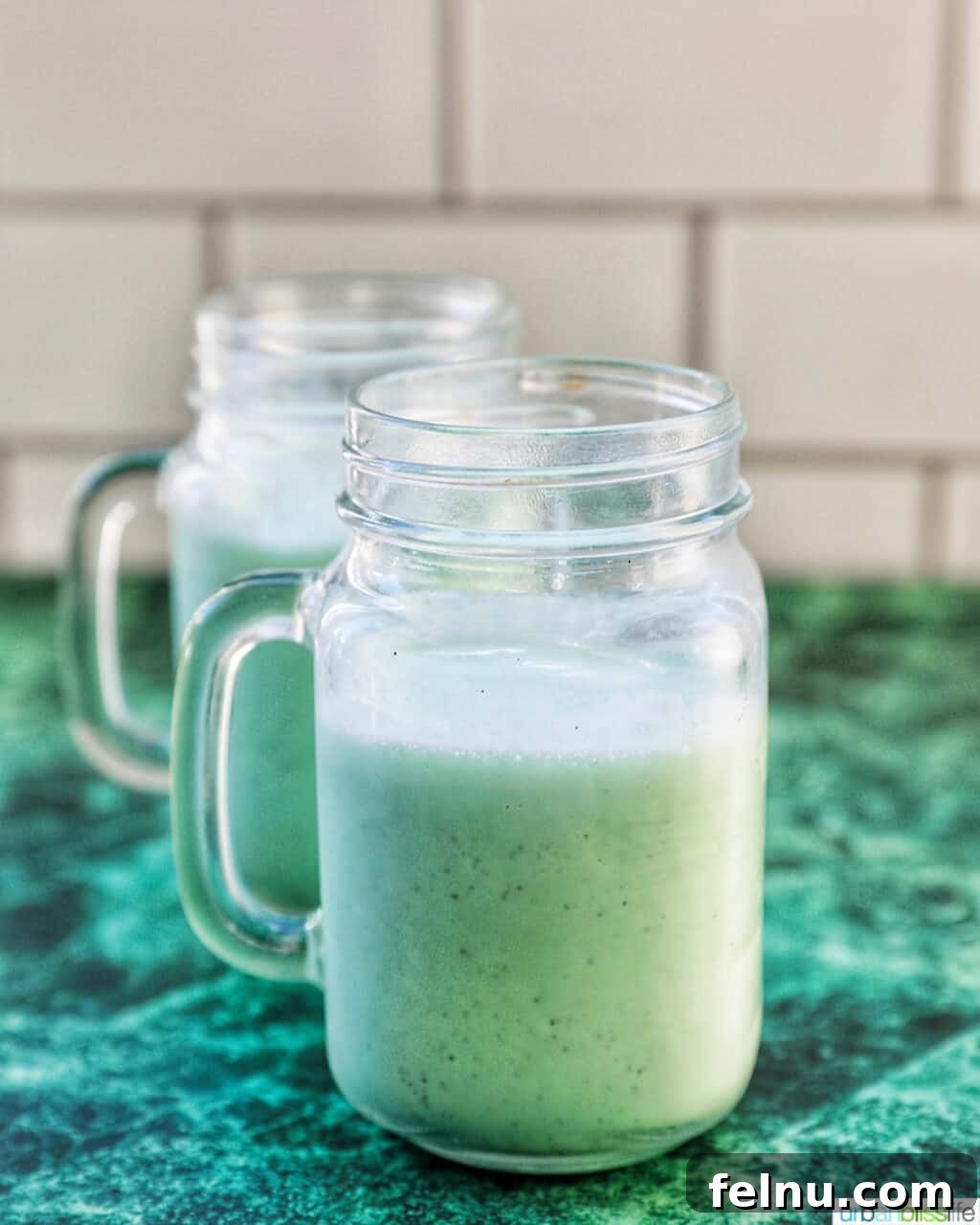 The Best Homemade Shamrock Shake 9 Shamrock Shakes in two glasses