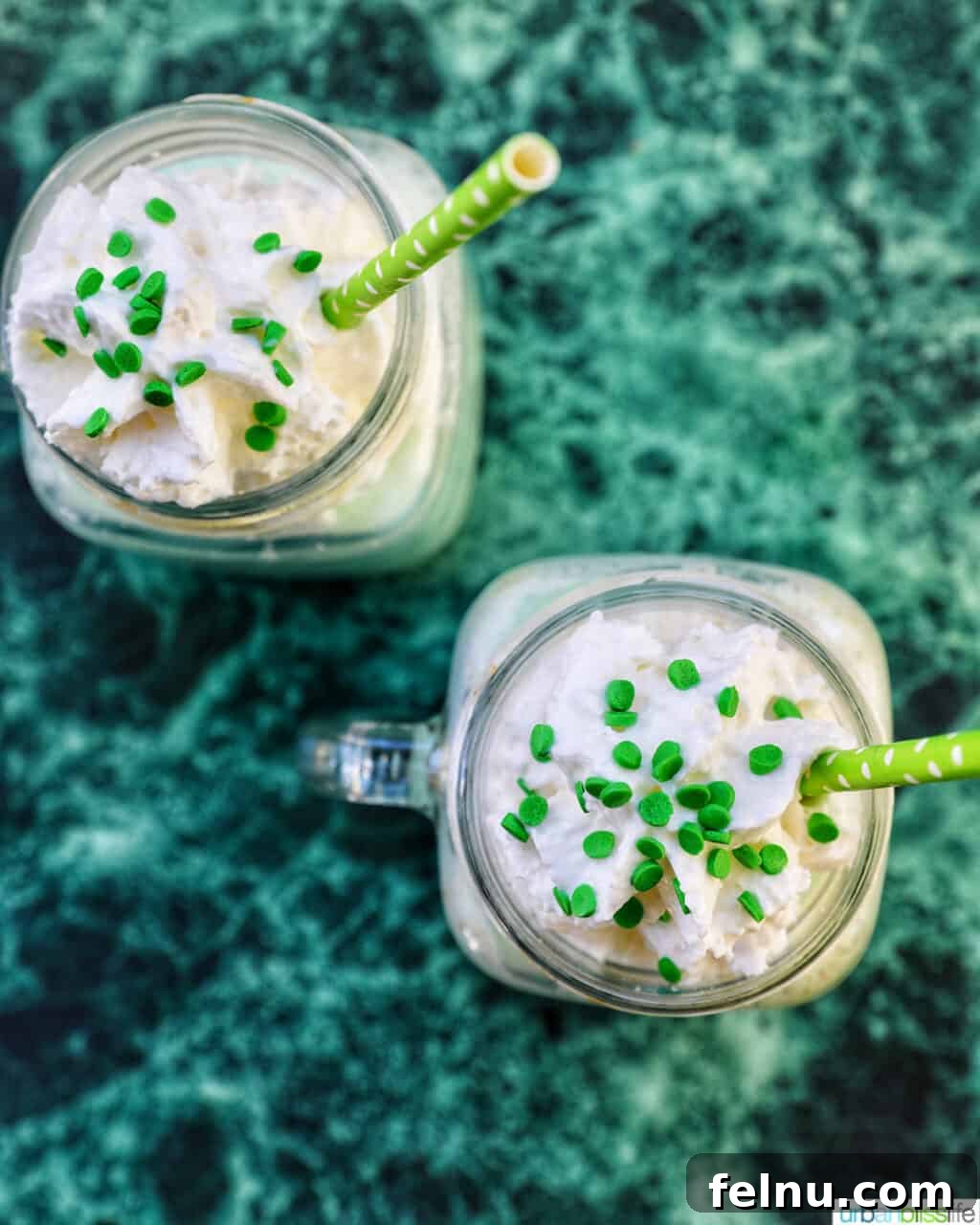 The Best Homemade Shamrock Shake 10 Two glasses of Shamrock Shakes overhead view