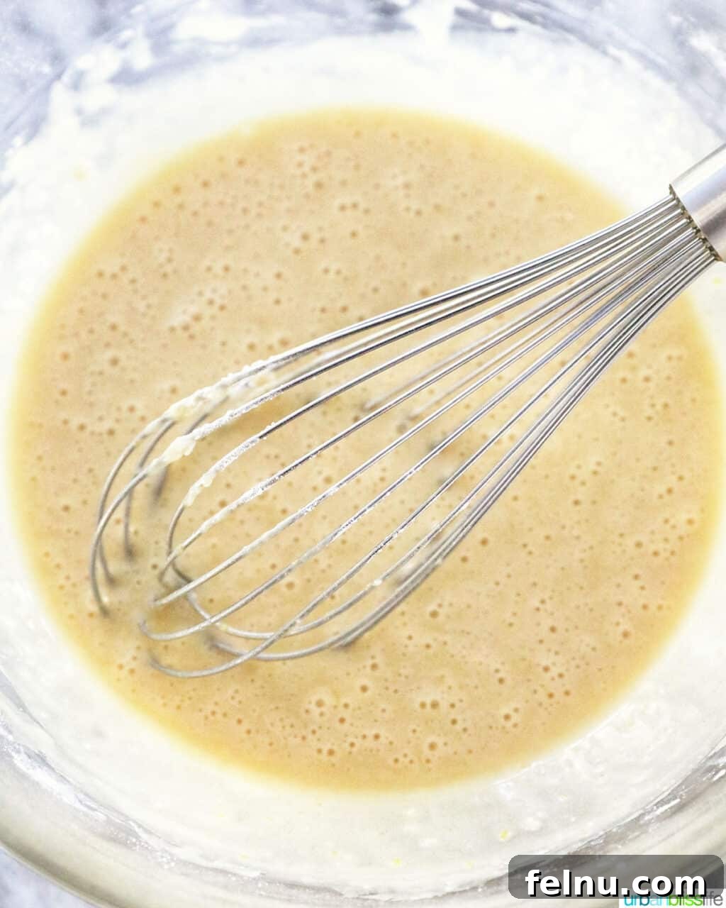 Taisan: Fluffy Filipino Chiffon Cake Perfection 13 Smooth batter for Taisan Filipino chiffon cake being whisked