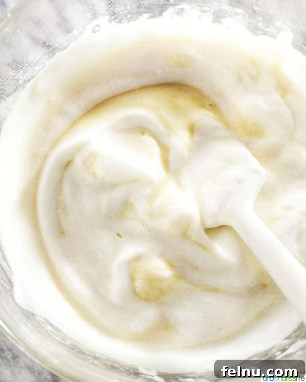 Taisan: Fluffy Filipino Chiffon Cake Perfection 18 Continue folding egg whites into cake batter until just combined