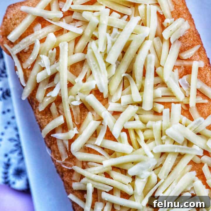 Taisan: Filipino Chiffon Cake with butter, sugar, and cheese topping