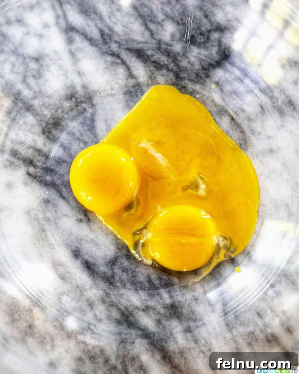 Taisan: Fluffy Filipino Chiffon Cake Perfection 8 Egg yolks in a bowl, separated from egg whites
