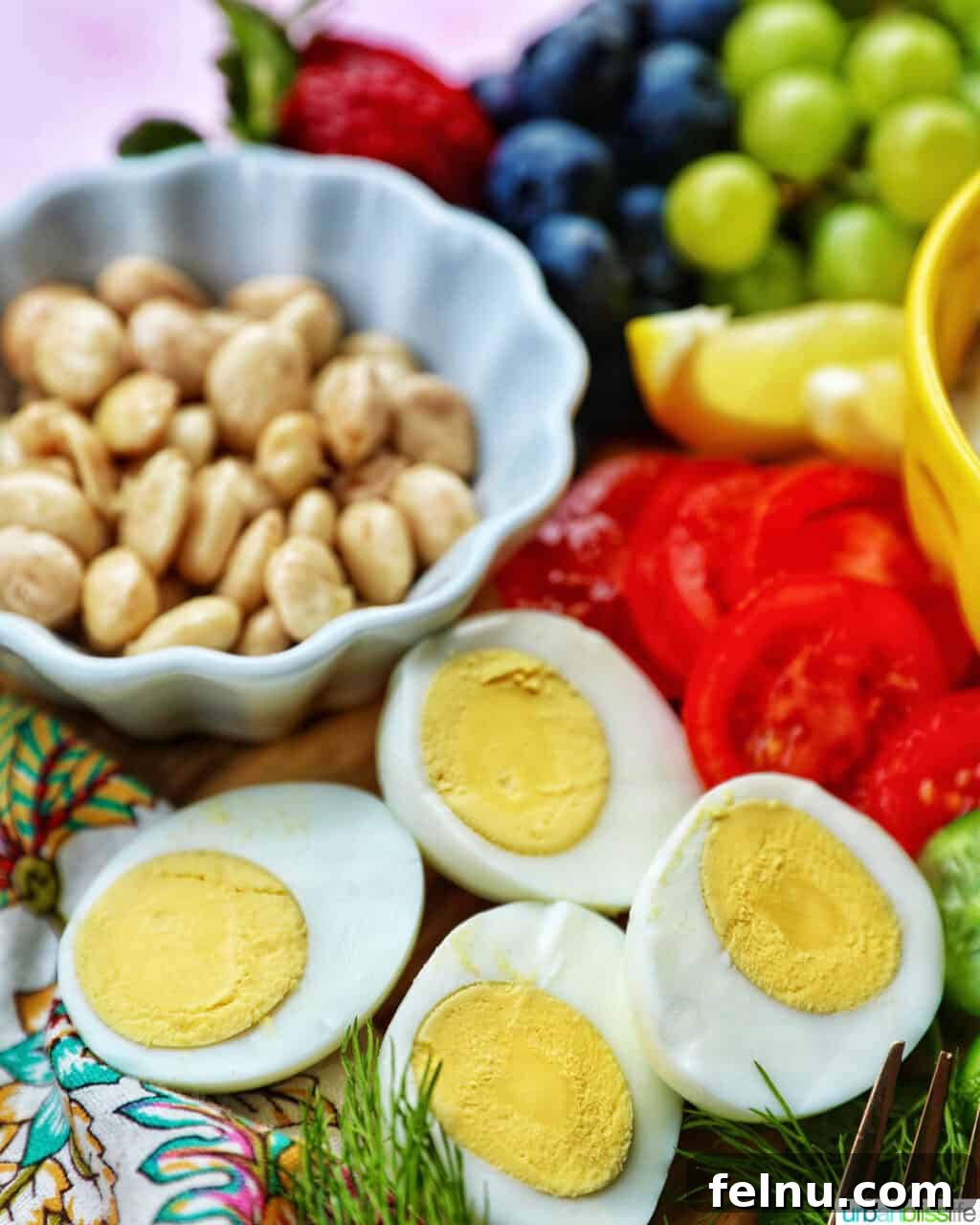 Brunch Grazing Platter 16 Almonds, sliced vegetables, and hard-boiled eggs strategically placed on the brunch board, enhancing both the visual appeal and the nutritional value.