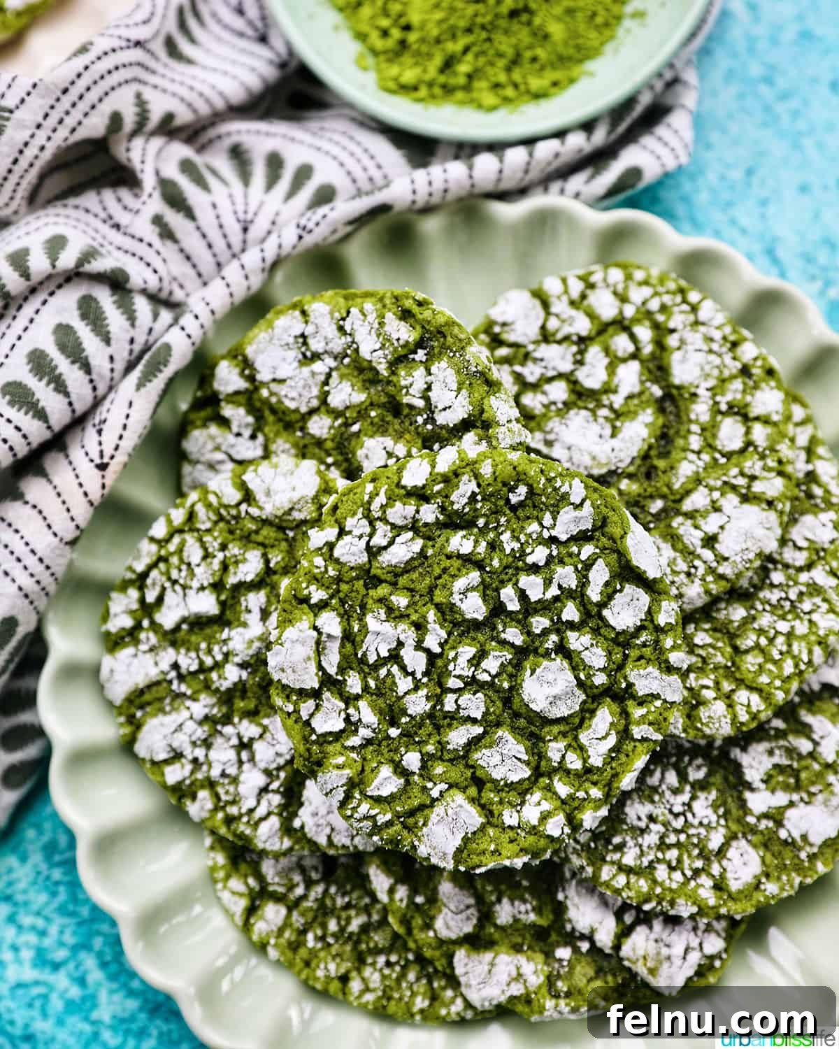 Matcha Magic Crinkles 2 Matcha Crinkle Cookies on a Plate