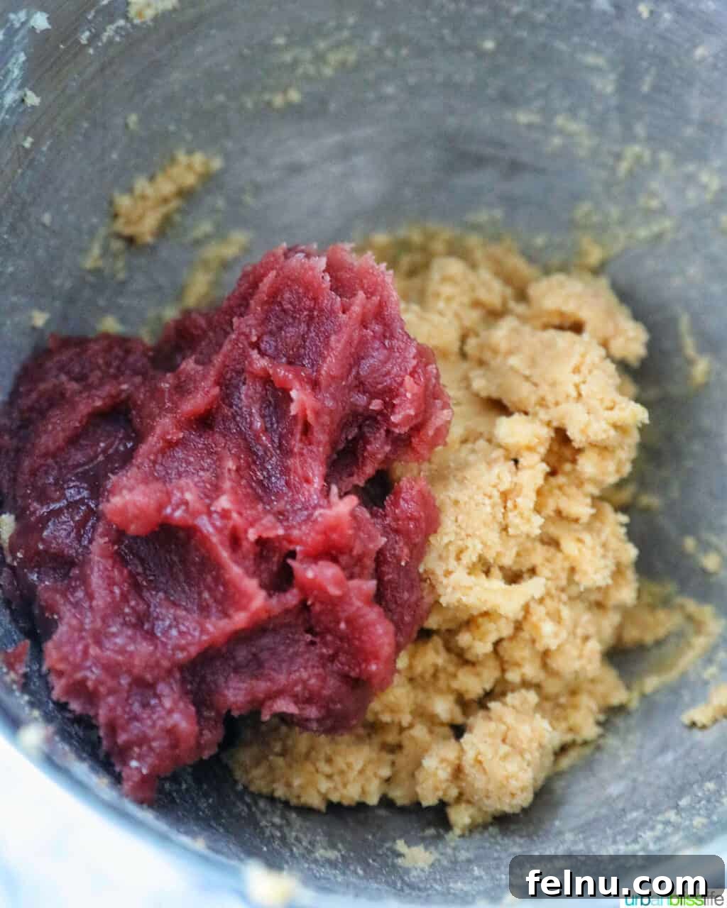 Ube and White Chocolate Dream Cookies 7 Ube jam and ube extract being added to the cookie batter.