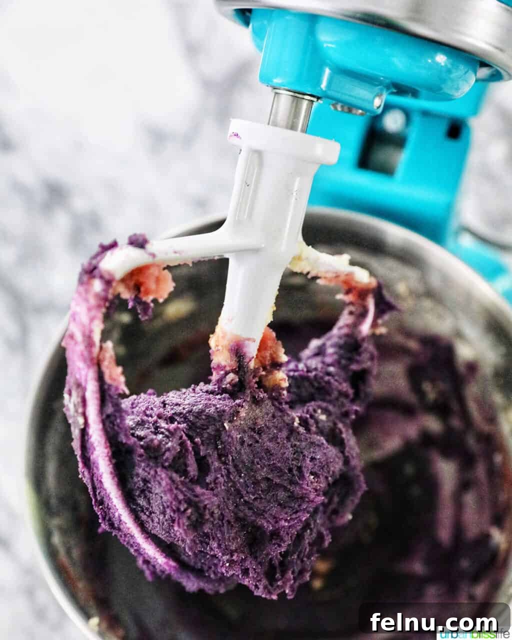 Ube and White Chocolate Dream Cookies 8 The vibrant purple Ube cookie batter after the addition of ube extract and ube jam.