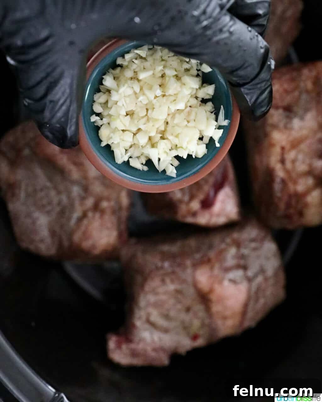 Slow Cooker Filipino-Style Beef Ribs Adobo 13 Adding Garlic to Short Ribs