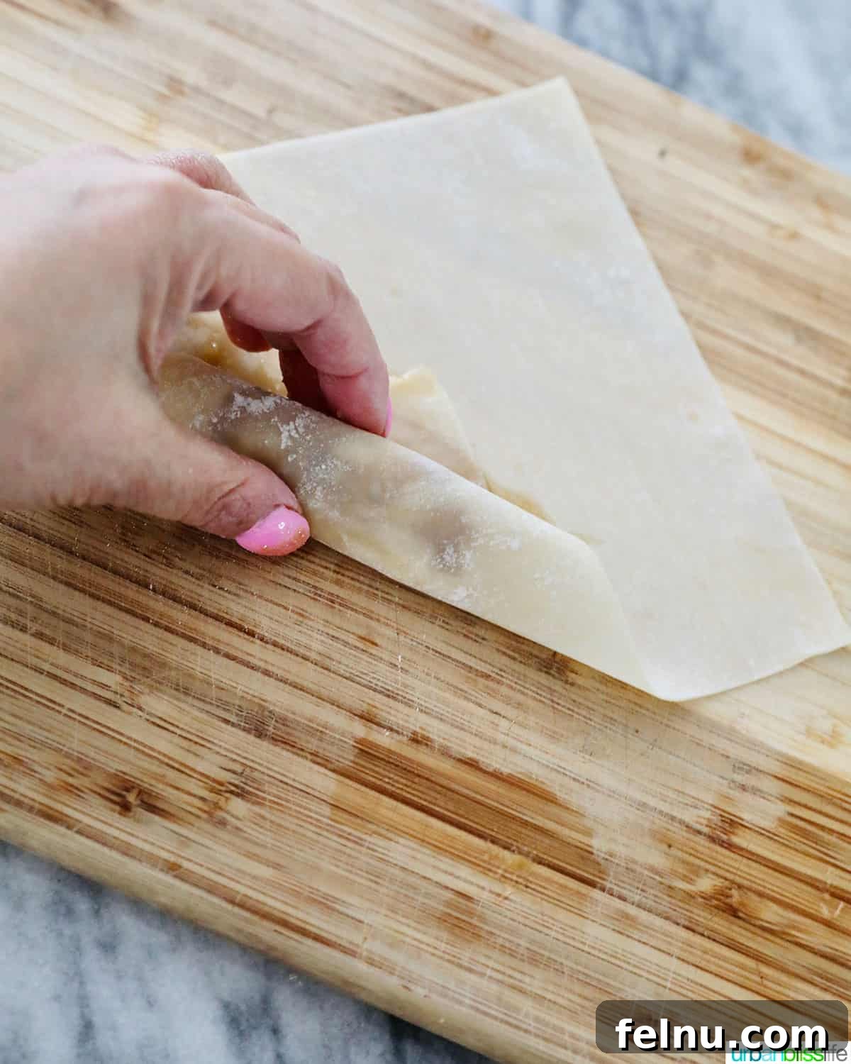 Effortless Filipino Turon: Crispy Banana Lumpia Perfection 12 Folding Filipino turon banana lumpia wrapper.
