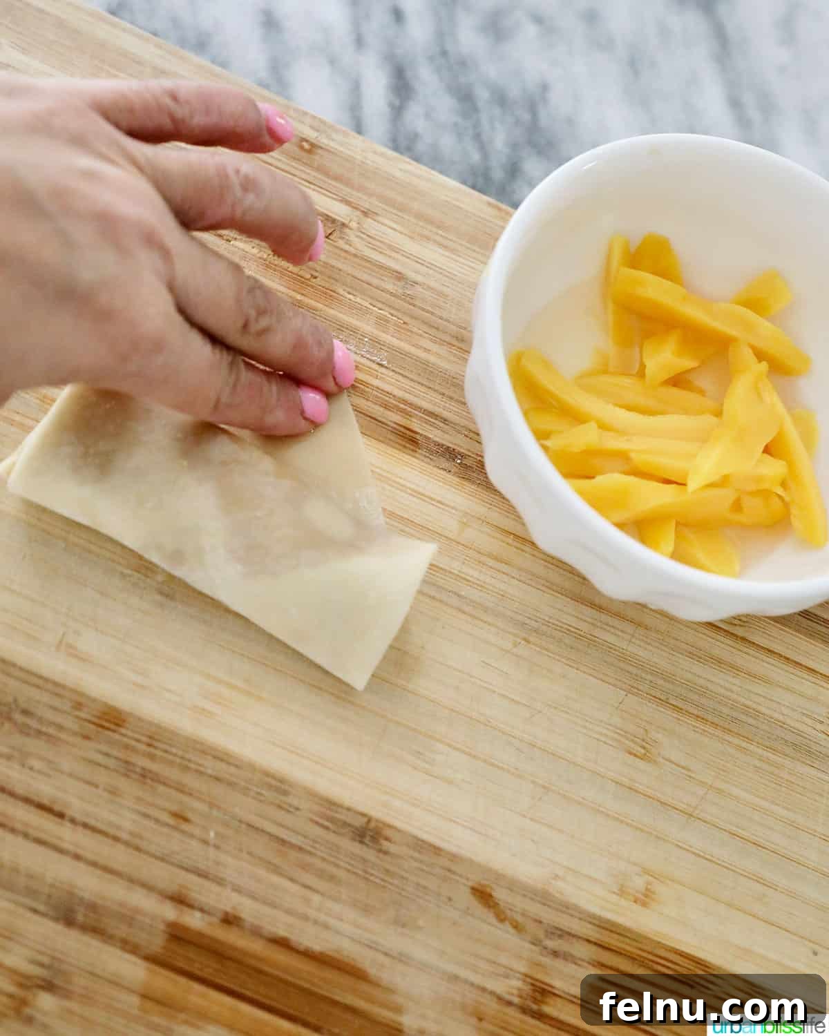 Effortless Filipino Turon: Crispy Banana Lumpia Perfection 15 Filipino turon banana lumpia wrapper with jackfruit ready for sealing.