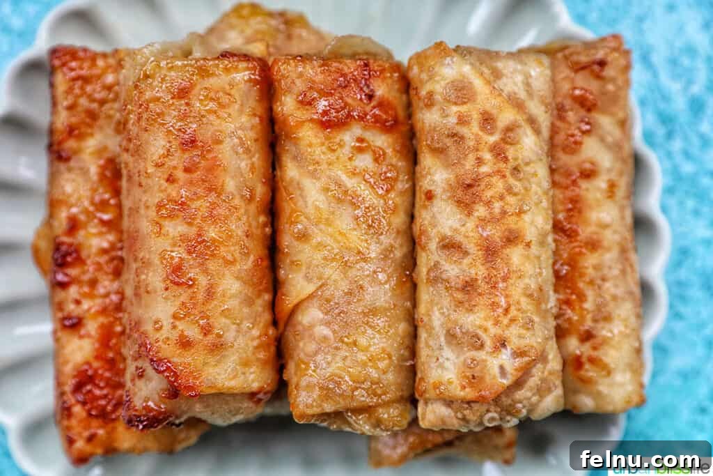 Effortless Filipino Turon: Crispy Banana Lumpia Perfection 19 Golden-fried Filipino turon banana lumpia.