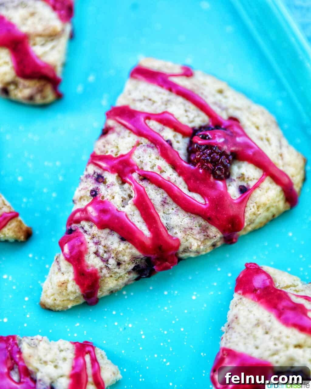 Close-up of Blackberry Scones with Blackberry Glaze