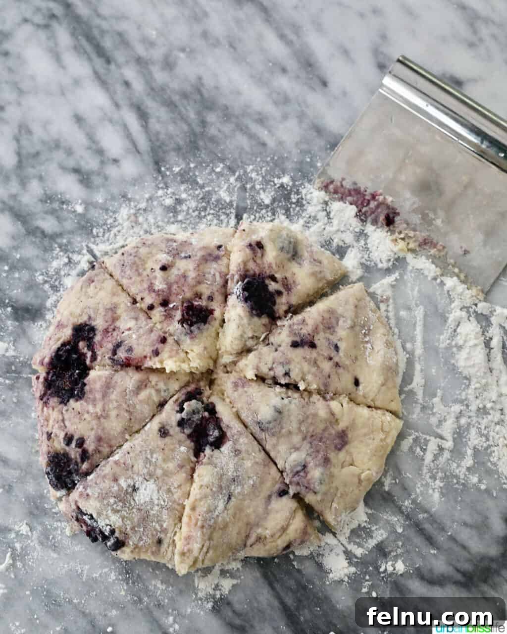 Blackberry scone dough sliced