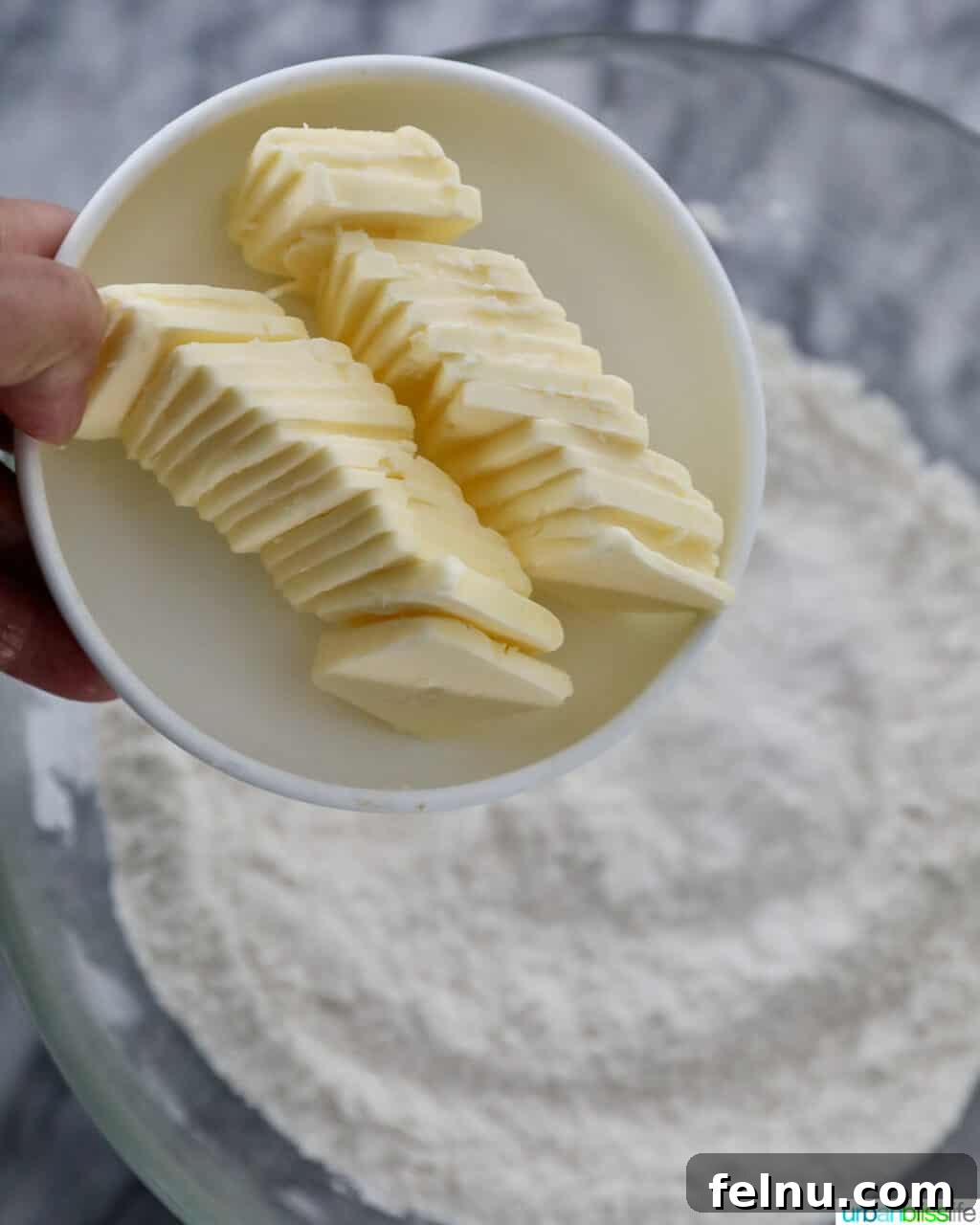 Adding butter to flour