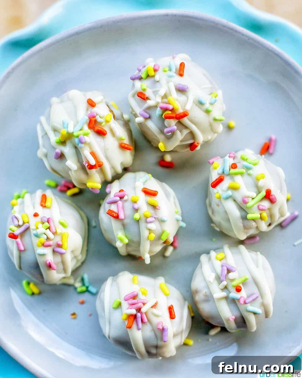 Decadent Cookie Dough Delights 2 chocolate chip cookie dough truffles with spring colored sprinkle