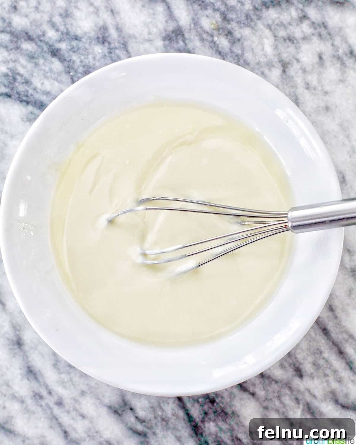 Decadent Cookie Dough Delights 10 whisking melted white chocolate