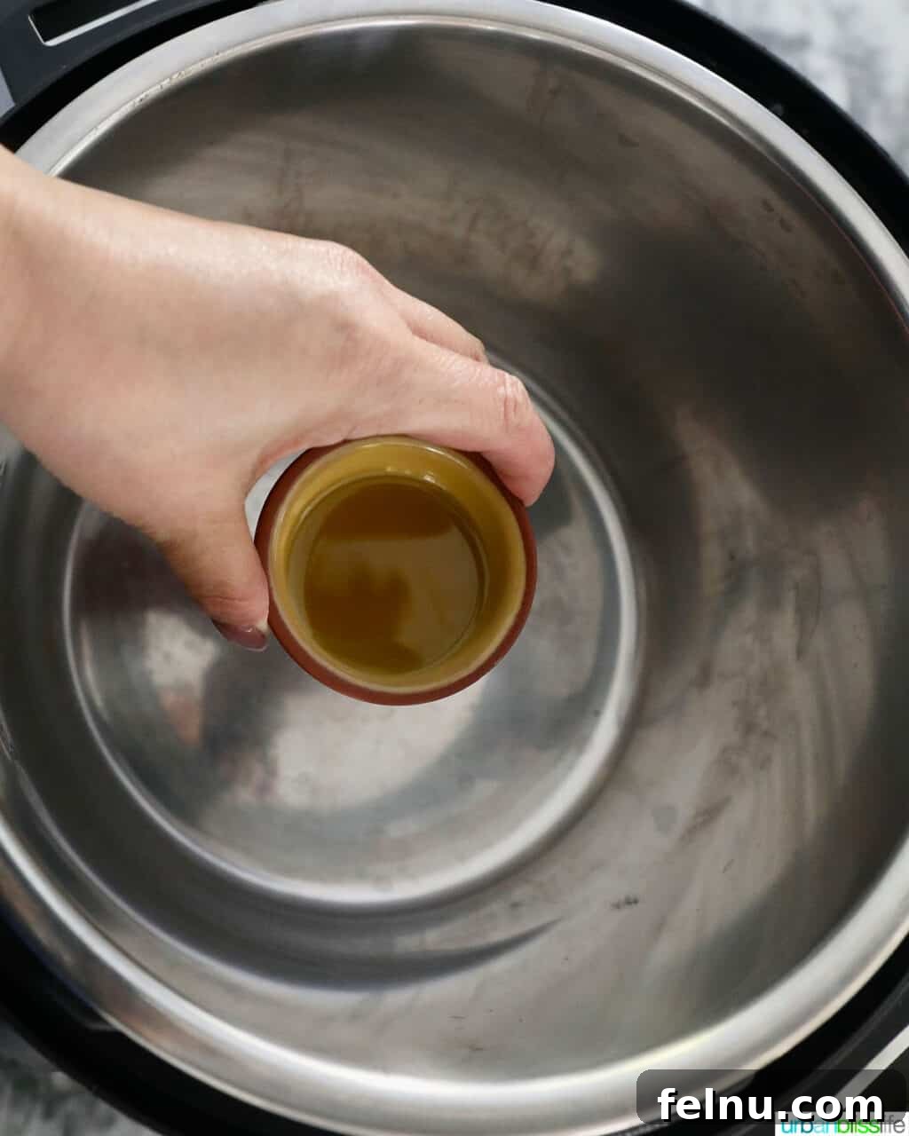 Sizzling Instant Pot Chicken Fajitas 7 Adding olive oil to the Instant Pot