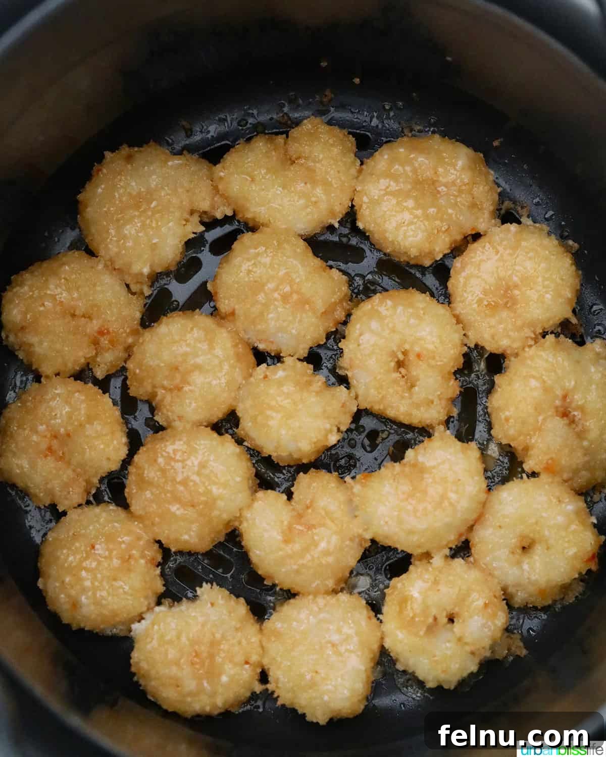 Bang Bang Shrimp: An Air Fryer Sensation 21 Bang bang shrimp in the air fryer basket.