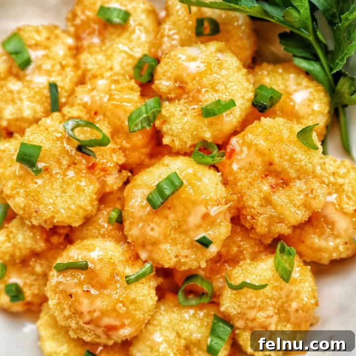 Air fryer bang bang shrimp with scallions.