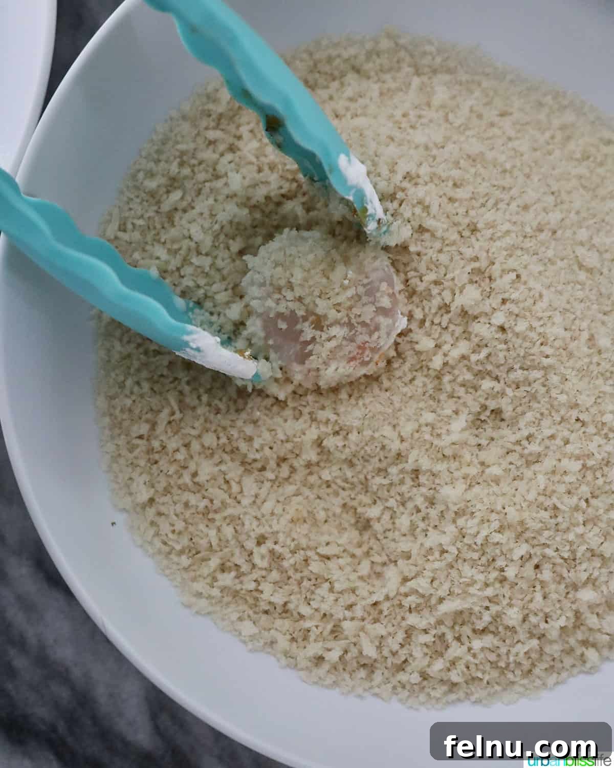 Bang Bang Shrimp: An Air Fryer Sensation 10 Coat shrimp with panko breadcrumbs