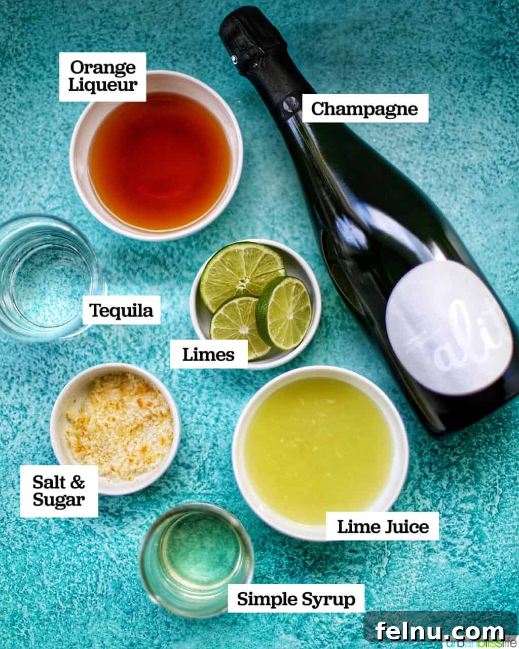 Sparkling Margarita Bliss 4 Ingredients laid out for making Champagne Margaritas