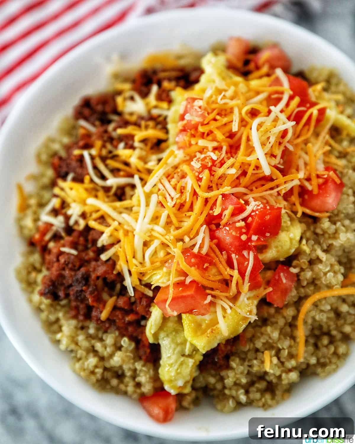 Chorizo breakfast bowl without avocados, topped with cheese