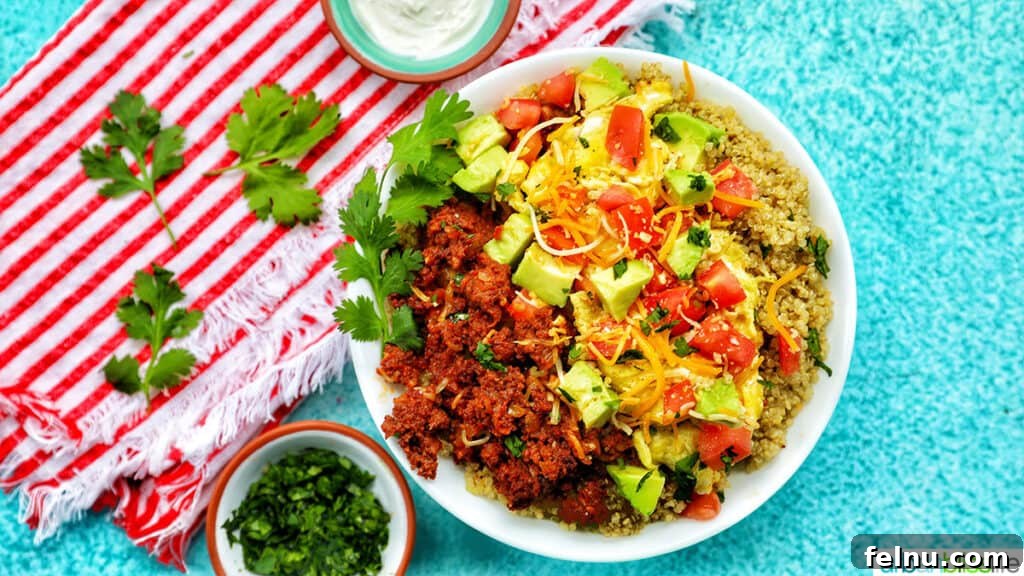 Chorizo Breakfast Bowl with sides of sour cream and cilantro