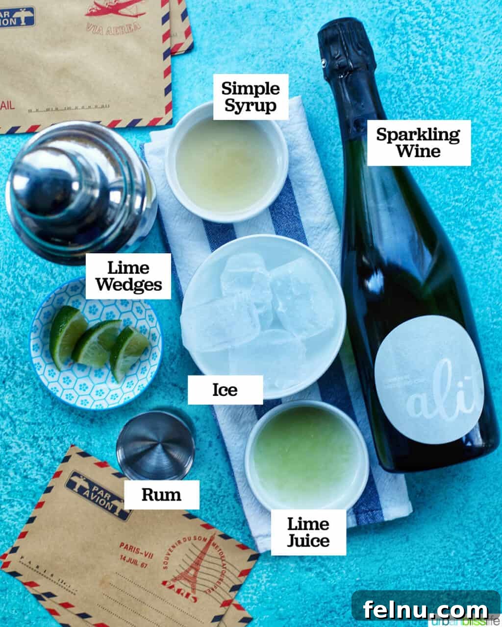First Class Flight 4 Ingredients laid out for an Airmail Cocktail: white rum, lime, simple syrup, and Champagne.