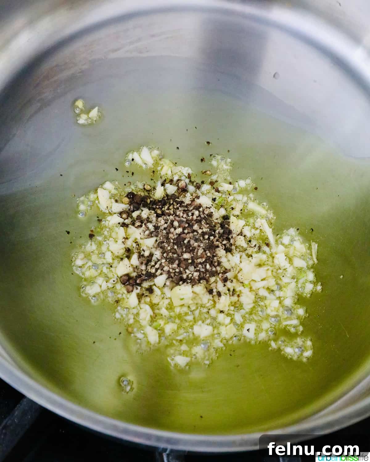 Shrimp Adobo with Coconut Cream 5 Cooking Garlic and Pepper in Pan: Building the Flavor Base
