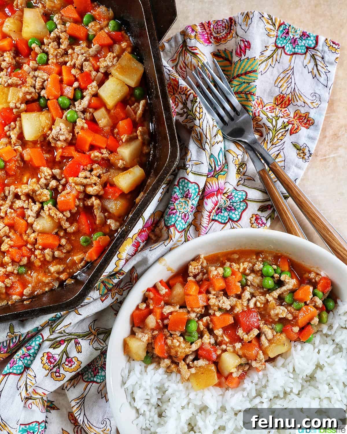 Ground Pork Menudo 2 Ground pork menudo in a skillet and with rice on a plate