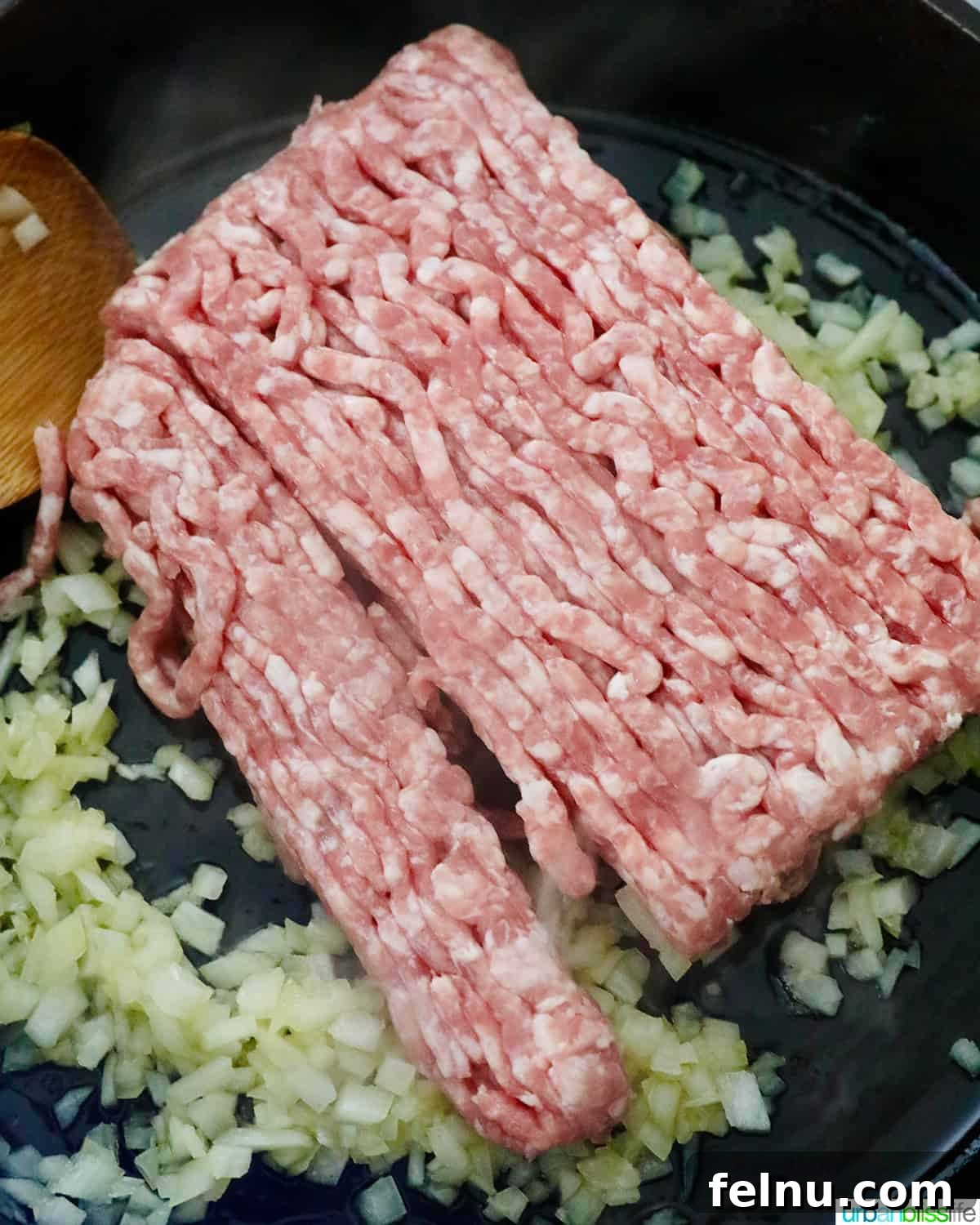 Ground Pork Menudo 5 Adding ground pork to pan